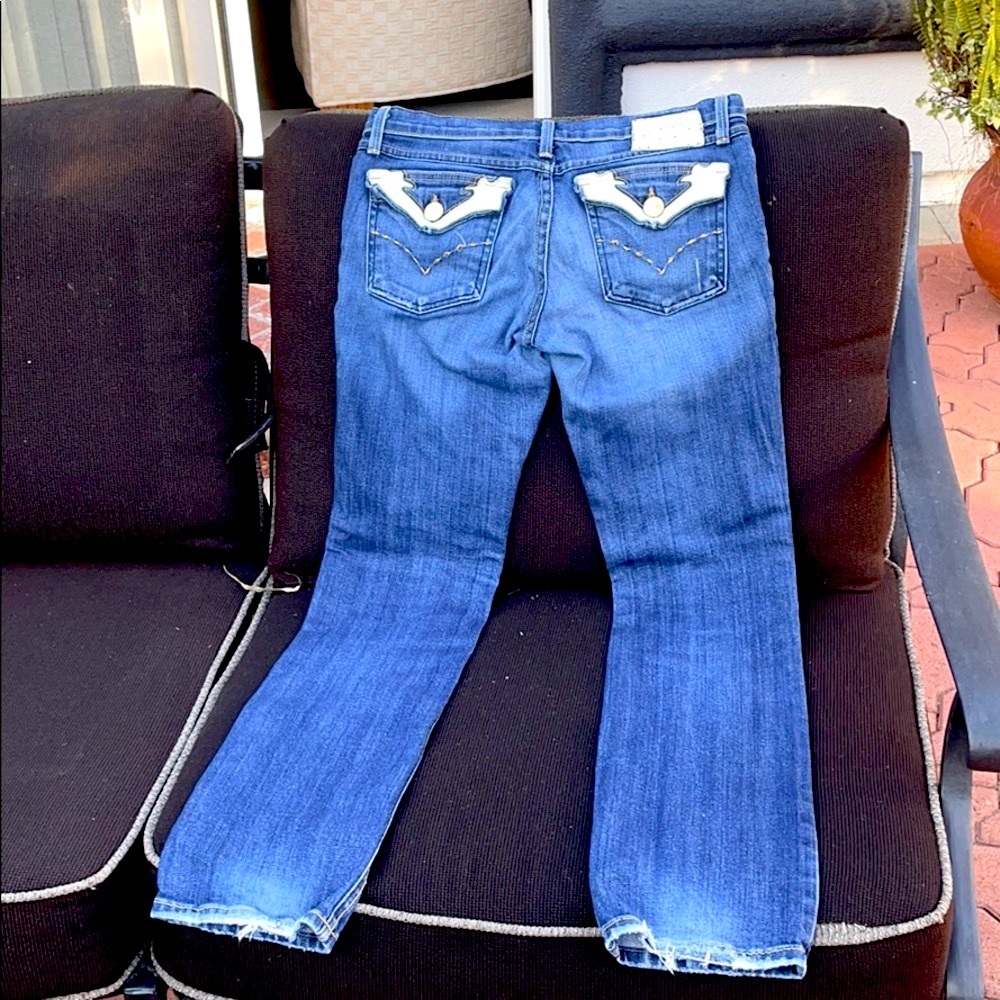 Jeans with white leather pockets